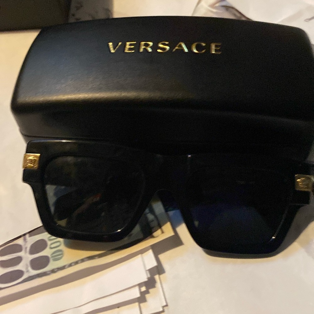 Brand new Versace sunglasses black with  navy blue gold trimming and lettering